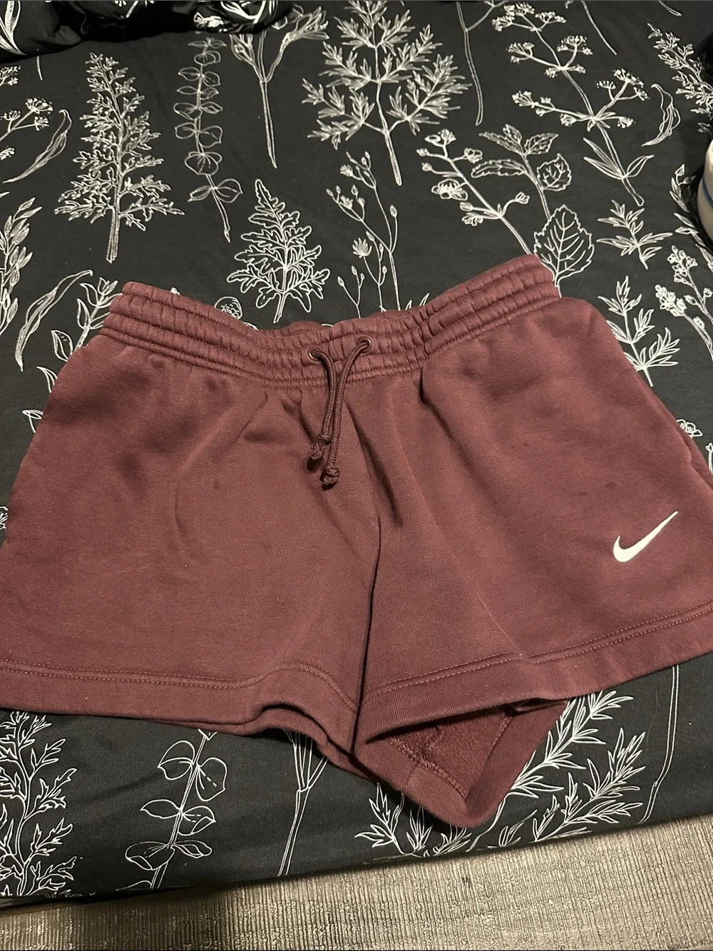 Nike Burgundy Women's Athletic Shorts with White Swoosh